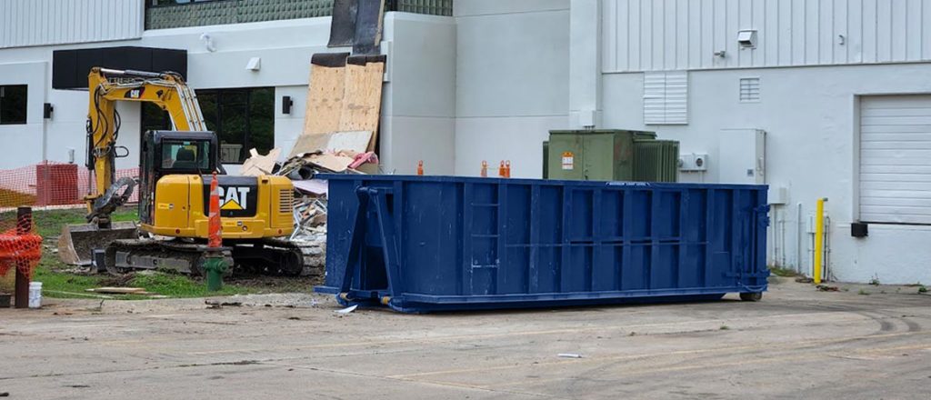 Dumpster Bin at back of building