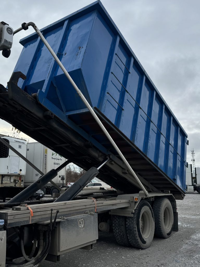 Elite Disposal Services | Roll-off dumpster truck with commercial 40 yard dumpster bin