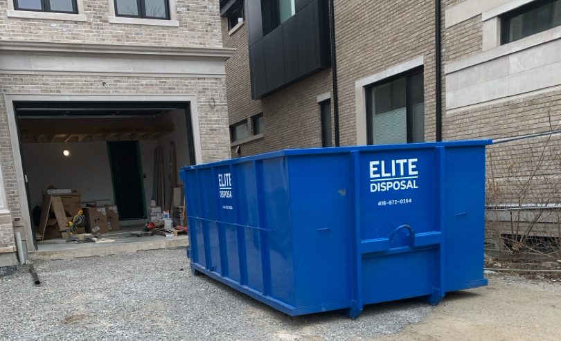 Professional dumpster rental from Elite Disposal Services at a residential renovation site