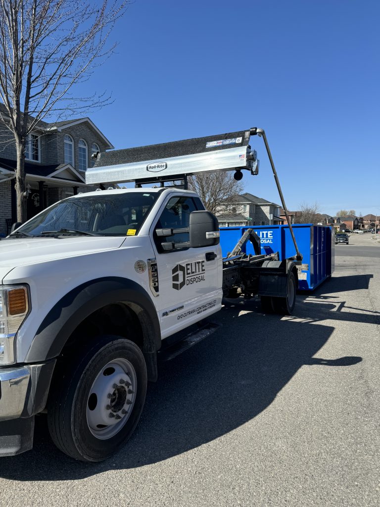 Elite Disposal Services delivering dumpster with proper permit in Toronto