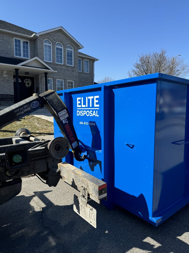 Elite Disposal Services team delivering a dumpster for a residential project avoiding dumpster rental mistakes